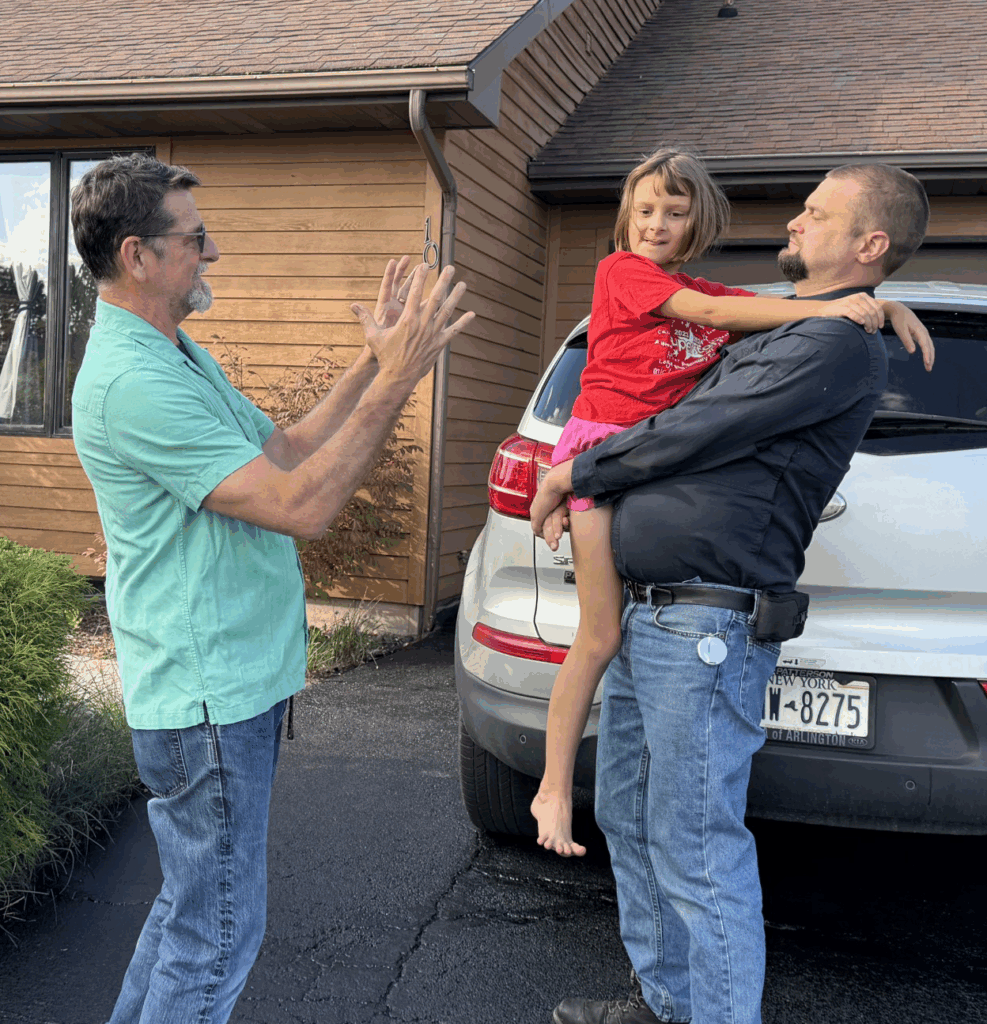 Scott Parrott, director of SHP’s Methodology and Statistics Support Team with his son-in-law and granddaughter