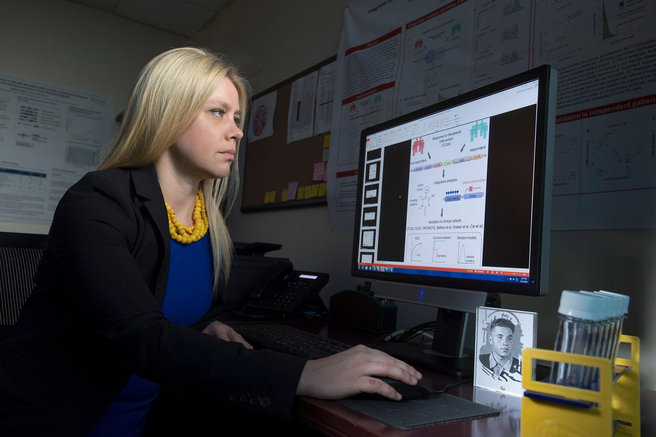 Assistant Professor Antonina Mitrovanova conducts health informatics research working with data in her computer lab.