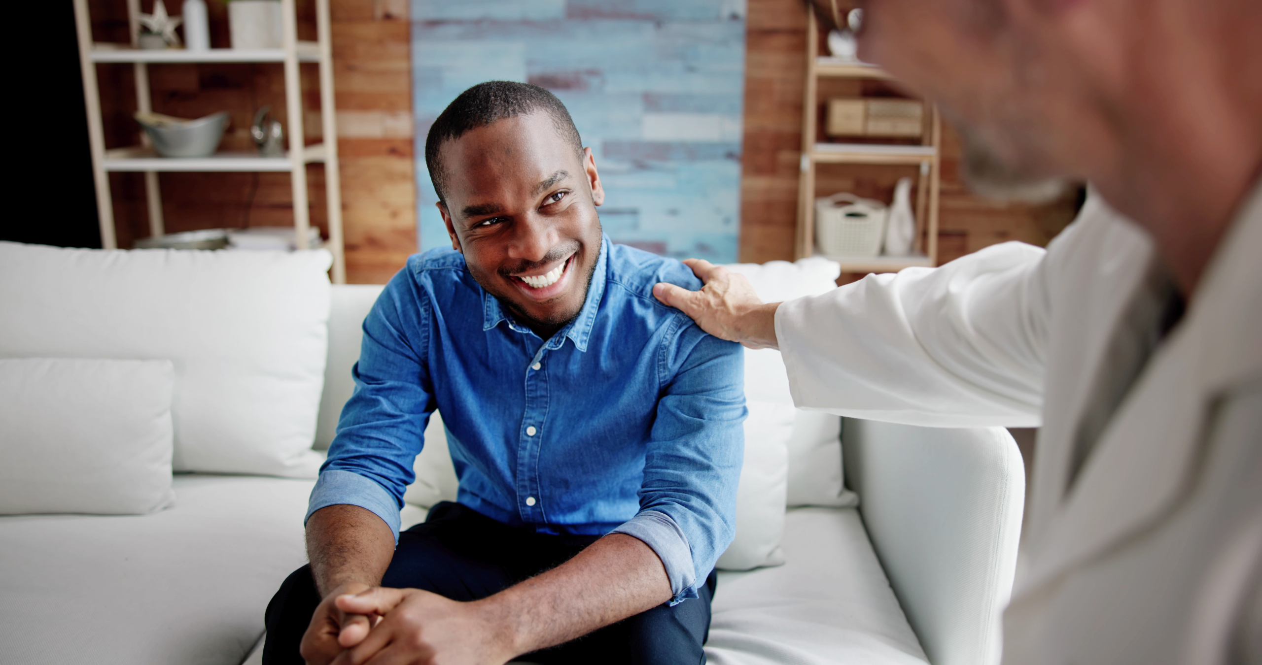 Home Care Patient Talking To His Doctor. Healthcare Service