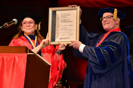 Dr. Barbara Demarco and Dr. Fredrick Coffman, at Convocation