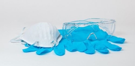 image of face mask, disposable gloves, and clear glasses