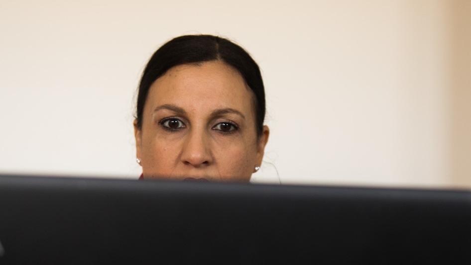 Female looking at computer screen