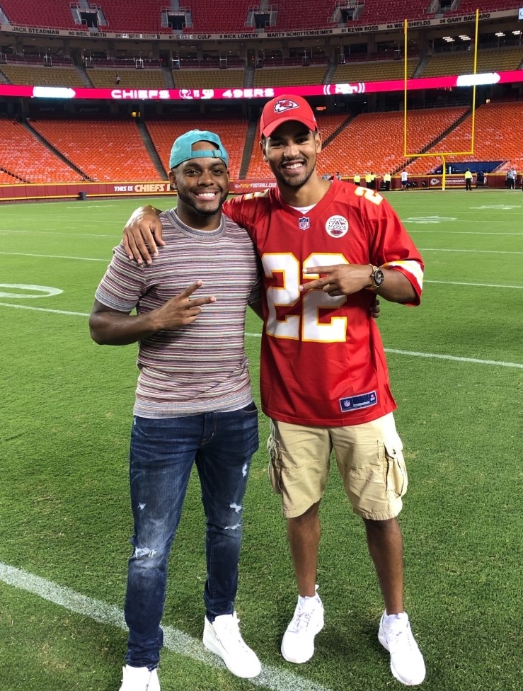 Juan Thornhill and Donnie Montague on the Kansas City Chiefs field