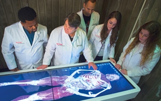 Students in Rutgers Physician Assistant program examine a new virtual cadaver